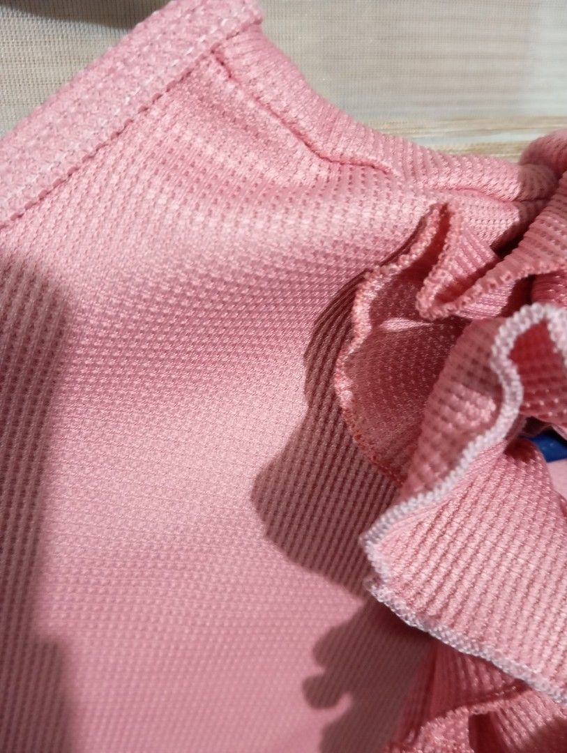Pink One Shoulder Ruffle Crop Top (Category: Sleeveless) located in Taguig. Submitted by louiseaust63096 (Listing ID 1466656390, Image 3). Description: used once last photo with minor flaw Vibrant pink one-shoulder crop top with a cute ruffled sleeve. Made of super stretchy, textured waffle knit fabric. From a smoke-free home..