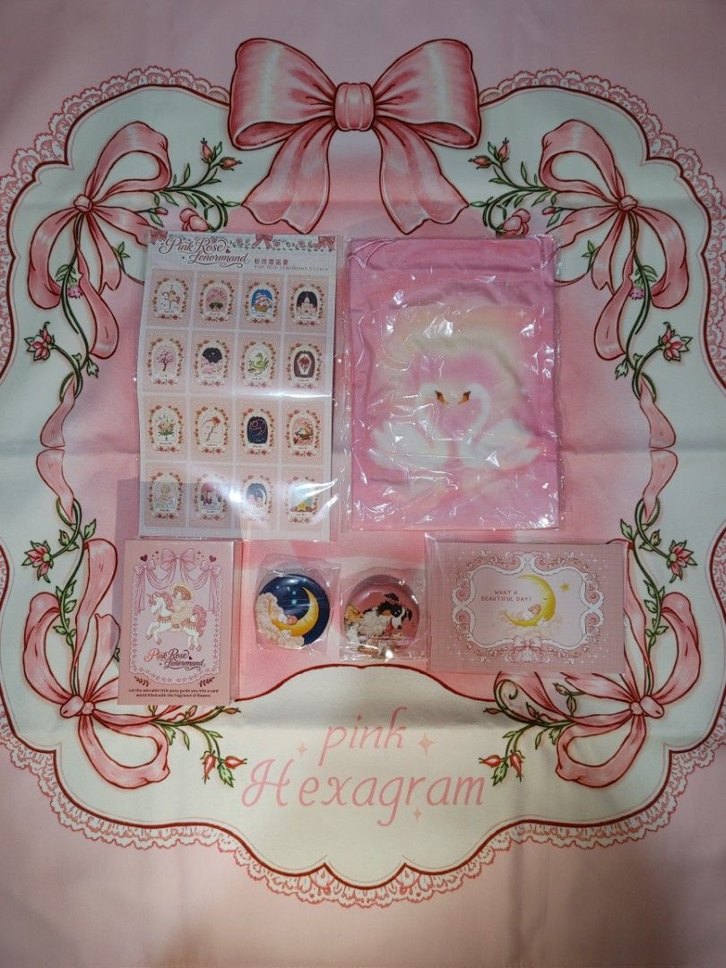 Pink Rose Lenormand Tarot Deck Set (Category: Board Games & Puzzles) located in Cavite. Submitted by adrienne_garcia (Listing ID 1466655590, Image 1). Description: Pink Rose Lenormand deck packaged with lots of extras. Includes two round metal badges, sticker sheet, illustrated card set, and a large pink swan drawstring pouch. Everything laid out on a matching pink Hexagram printed cloth mat. Unused items, still sealed in original packaging..