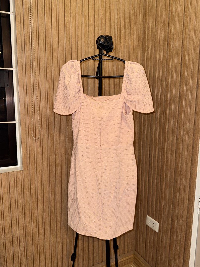 Pink square neck puff sleeve dress (Category: Dresses) located in Quezon City. Submitted by padillamyk (Listing ID 1466688521, Image 3). Description: - Color: Light pink with subtle gold dotted pattern - Neckline: Square neck with short puff sleeves - Fit: Fitted upper silhouette, hits around the knee - Closure: Back zipper - Occasion: Ideal for parties or dinners - Used once.