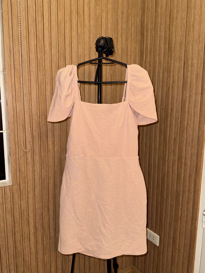 Pink square neck puff sleeve dress (Category: Dresses) located in Quezon City. Submitted by padillamyk (Listing ID 1466688521, Image 1). Description: - Color: Light pink with subtle gold dotted pattern - Neckline: Square neck with short puff sleeves - Fit: Fitted upper silhouette, hits around the knee - Closure: Back zipper - Occasion: Ideal for parties or dinners - Used once.