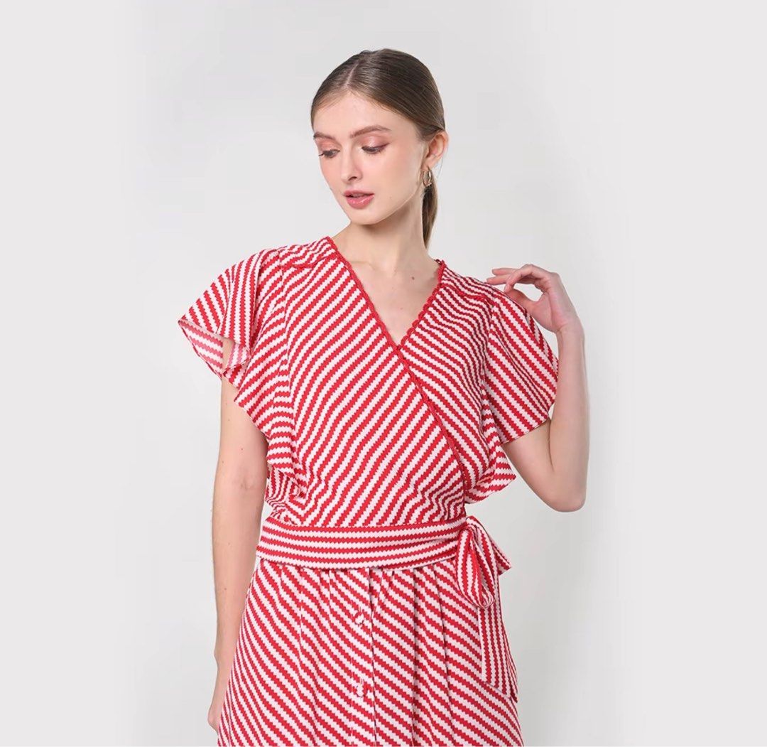 Plains & Prints Red and White Wrap Top (Category: Blouses) located in Bacoor. Submitted by lavanderpeach (Listing ID 1466618835, Image 1). Description: - Large size (please see size chart in the photos attached) - washed but unused; RFS - decluttering - Payment first via e-wallet/bank transfer - Pick up at my house (Molino IV) or via lalamove c/o buyer.