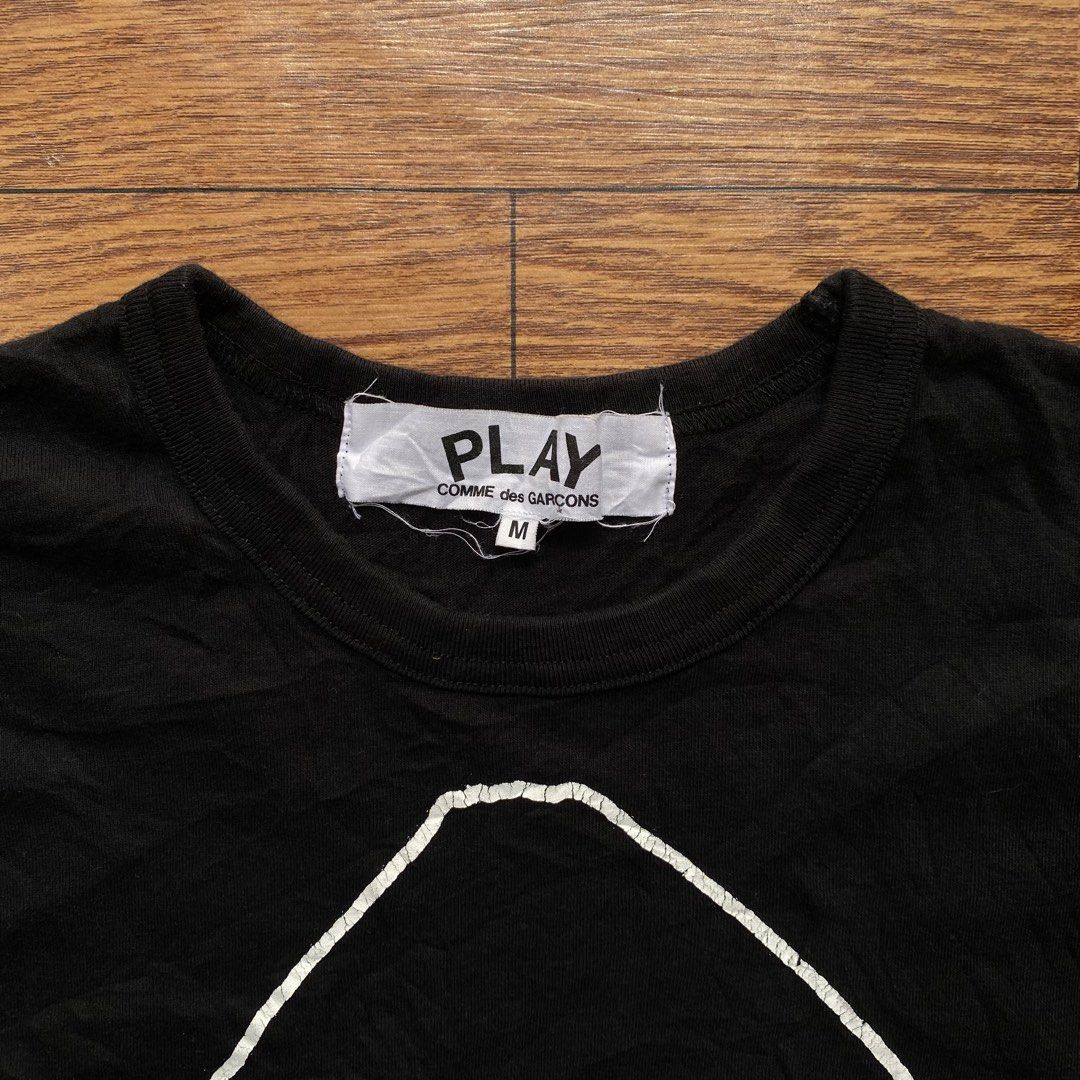 Play By Comme Des Garçons (Category: Tshirts & Polo Shirts ) located in Cebu City. Submitted by lawydthrift (Listing ID 1466596175, Image 2). Description: Medium on tag Crack on print Authentic .