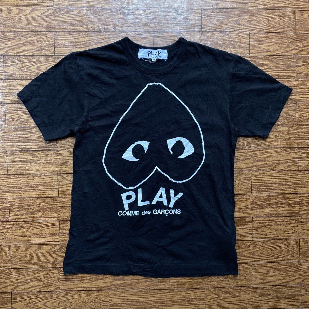 Play By Comme Des Garçons (Category: Tshirts & Polo Shirts ) located in Cebu City. Submitted by lawydthrift (Listing ID 1466596175, Image 1). Description: Medium on tag Crack on print Authentic .