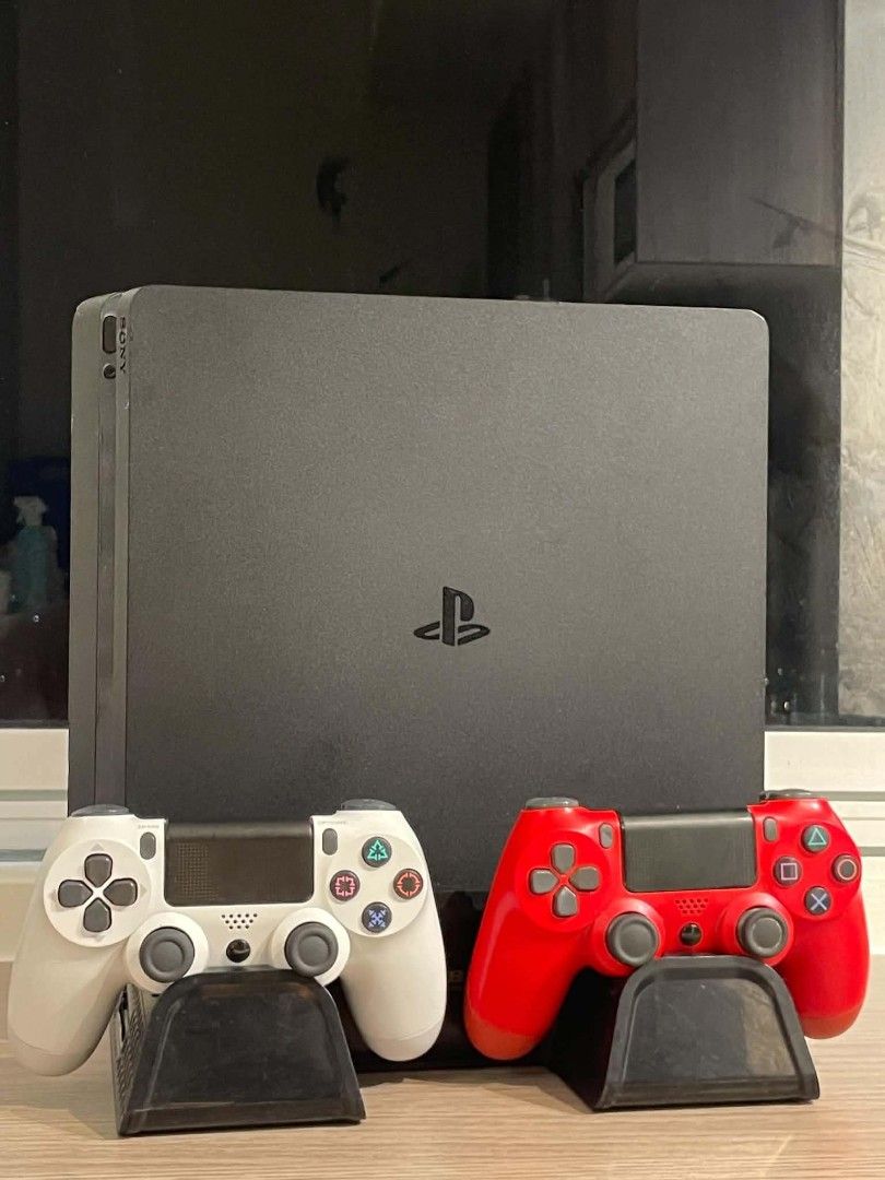 PlayStation 4 Slim Console with 2 Controllers and 8 Games (Category: PlayStation) located in Manila. Submitted by markfuna613361 (Listing ID 1466764651, Image 2). Description: Selling my PS4 complete gaming bundle. Everything is working and ready to play. Inclusions: PS4 1tb 13.5 (can be jailbreak) 2x Original Sony DualShock 4 controllers PS4 controller charging dock Controller charger/cable Power cable 8 original PS4 games: It Takes Two NBA 2K25