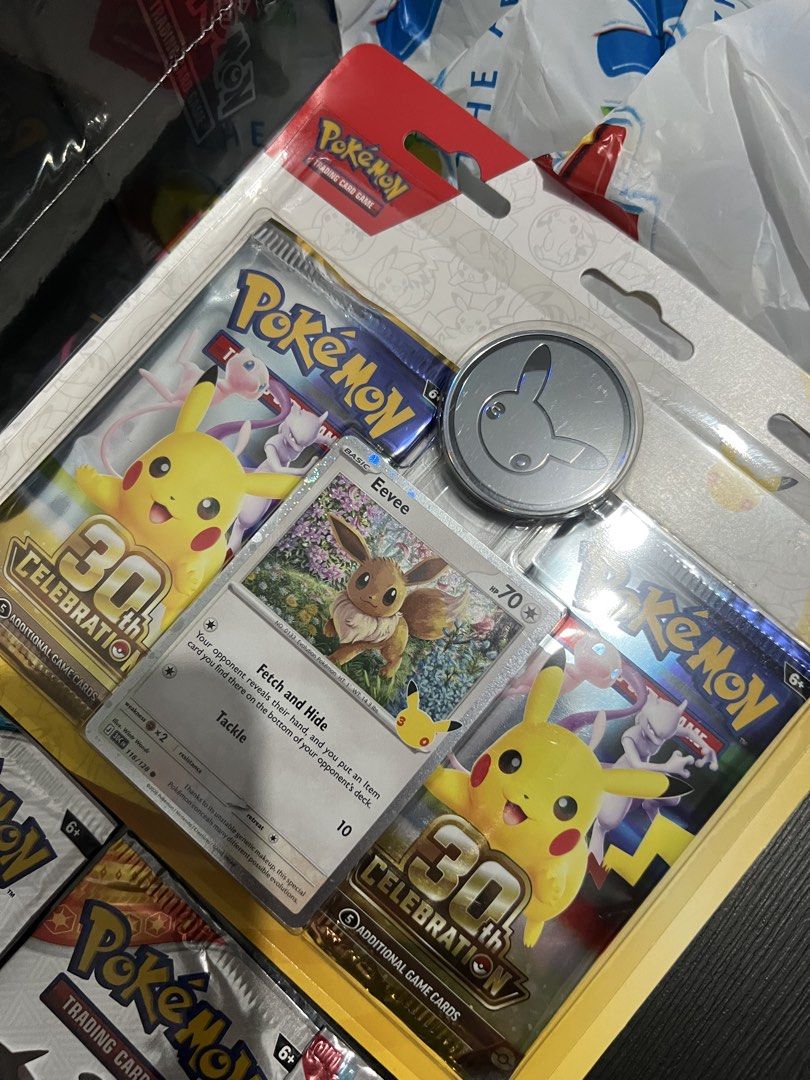 Pokémon 30th Celebration Collection Box English (Category: Card Boxes & Cases) located in Makati City. Submitted by christian.19 (Listing ID 1466723432, Image 3). Description: Pitch black etb - 5k Pokemon 30th 2-blister pack - 3200 Mcdonalds 2024 fun pack - 550 Scarlet and violet fun pack - 450 Surging sparks fun pack - 950 Twilight Masquerade fun pack - 550 All sealed and brandnew Pm lang makati area.