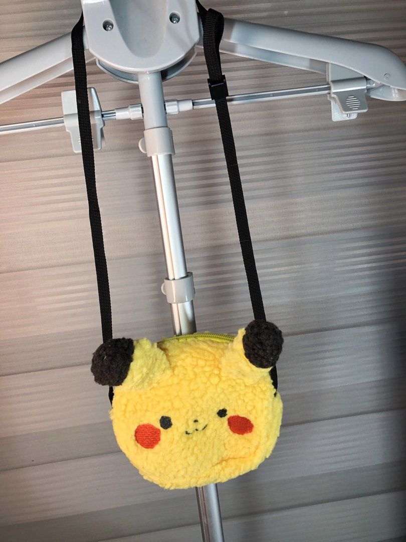Pokémon Pikachu Plush Crossbody Bag (Category: Babies & Kids Fashion) located in Manila. Submitted by all.dressed.up (Listing ID 1466773634, Image 2). Description: Super soft & fluffy: Bright yellow sherpa fleece texture with adorable 3D plush ears Cute details: Embroidered red cheeks and stitched happy smile Secure & practical: Zip-top closure with clean yellow lining Adjustable fit: Comes with a sturdy, adjustable black nylon strap Perfect dail
