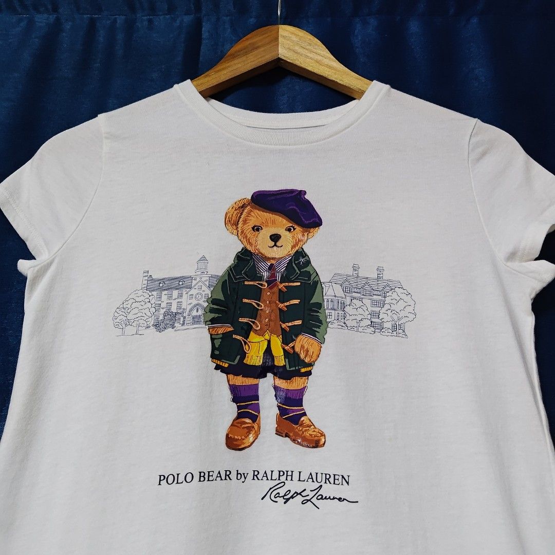 POLO BY RALPH LAUREN BEAR TOPS (Category: Shirts) located in Makati City. Submitted by upcycled.closeth (Listing ID 1466588009, Image 2). Description: - Authentic Ralph Lauren product - White, short-sleeved - Size: small to medium (women's) - Like new - Authentic - flaws: no flaws - Excellent condition - Need wash, fresh from bale - Features design of Polo by Ralph Lauren bear tops - Material: 100% cotton !!STILL NEGOTIABLE!!.