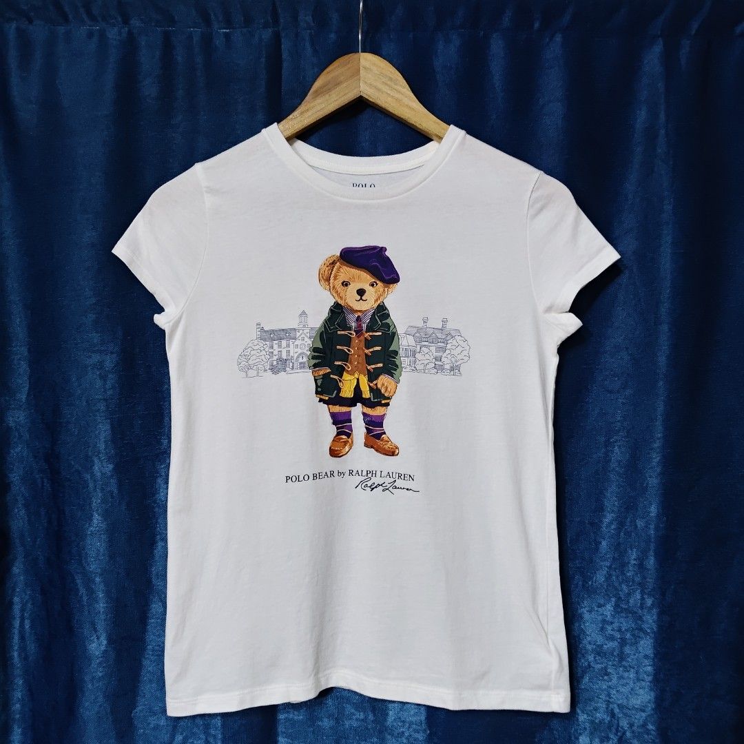 POLO BY RALPH LAUREN BEAR TOPS (Category: Shirts) located in Makati City. Submitted by upcycled.closeth (Listing ID 1466588009, Image 1). Description: - Authentic Ralph Lauren product - White, short-sleeved - Size: small to medium (women's) - Like new - Authentic - flaws: no flaws - Excellent condition - Need wash, fresh from bale - Features design of Polo by Ralph Lauren bear tops - Material: 100% cotton !!STILL NEGOTIABLE!!.