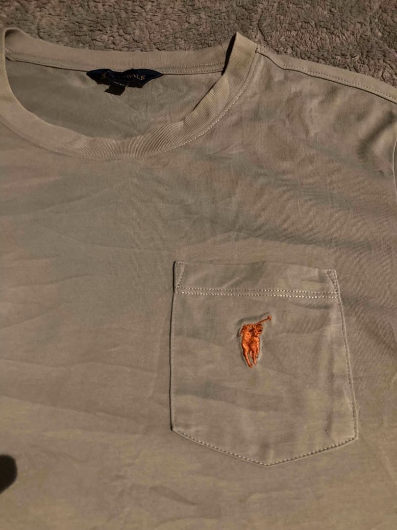 Polowalk T-Shirt with Pocket (Category: Tshirts & Polo Shirts ) located in Bulacan. Submitted by foundnfold (Listing ID 1466574850, Image 2). Description: Polowalk - Size: L (Check photos for exact measurements) - WIDTH: 21 INCH -LENGTH: 27 INCH - COLOR RATE: 10/10 - Condition: Clean fabric with normal wear.