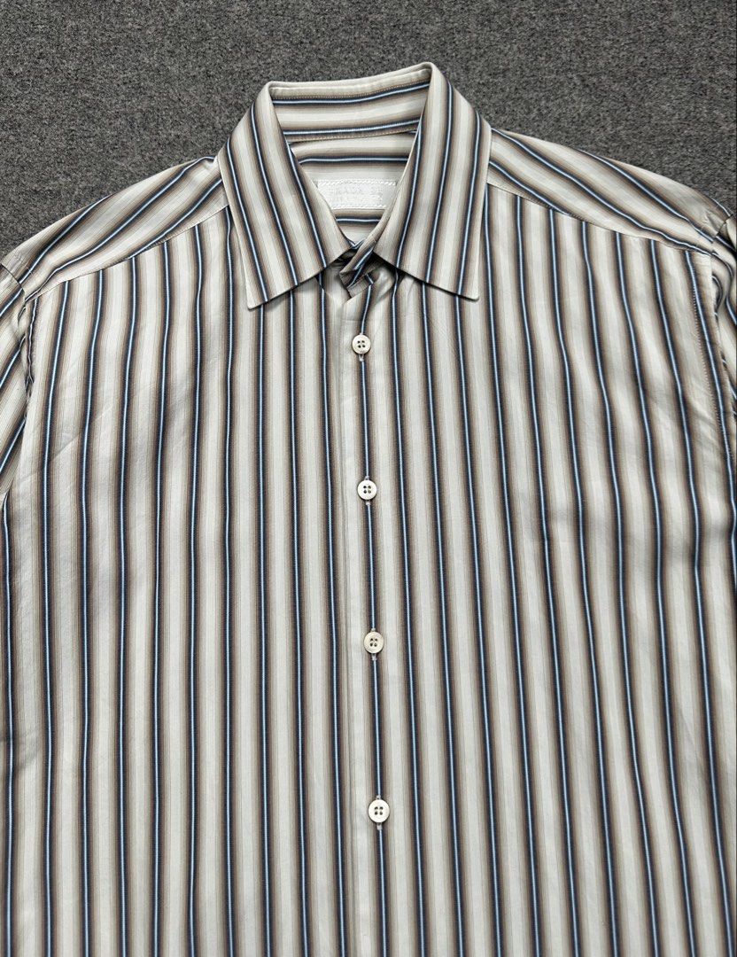 Prada - 00’s Rust Effect Stripes Button Down Shirt (Category: Formal Shirts) located in Manila. Submitted by scissor.2fifthy (Listing ID 1466572962, Image 2). Description: Prada - 00’s Rust Effect Stripes Button Down Shirt Tagged size: 38 fits Medium Men’s(see measurement) Made in Italy Material: 100% Cotton 85/100 condition rate Used with care Flaw: Minor sign of usage and small scratch (see last picture) Very presentable Check all photos for mo