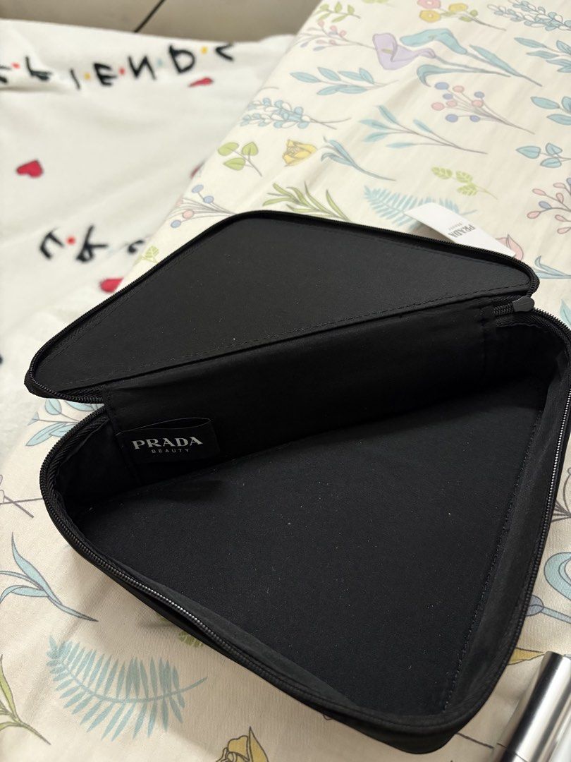PRADA Beauty Triangle Cosmetic Pouch Pink Black (Category: Luxury Bags & Wallets) located in Taytay. Submitted by angeltyyyy (Listing ID 1466569491, Image 2). Description: selling this makeup pag from Prada Beauty, super cuteeee nabudol din ako dito 😂💗 infairness it can fit lots insideee 🫶🏻 loc: taytay, rizal (can also ship from QC and Pasay, depending on sched 💗) .