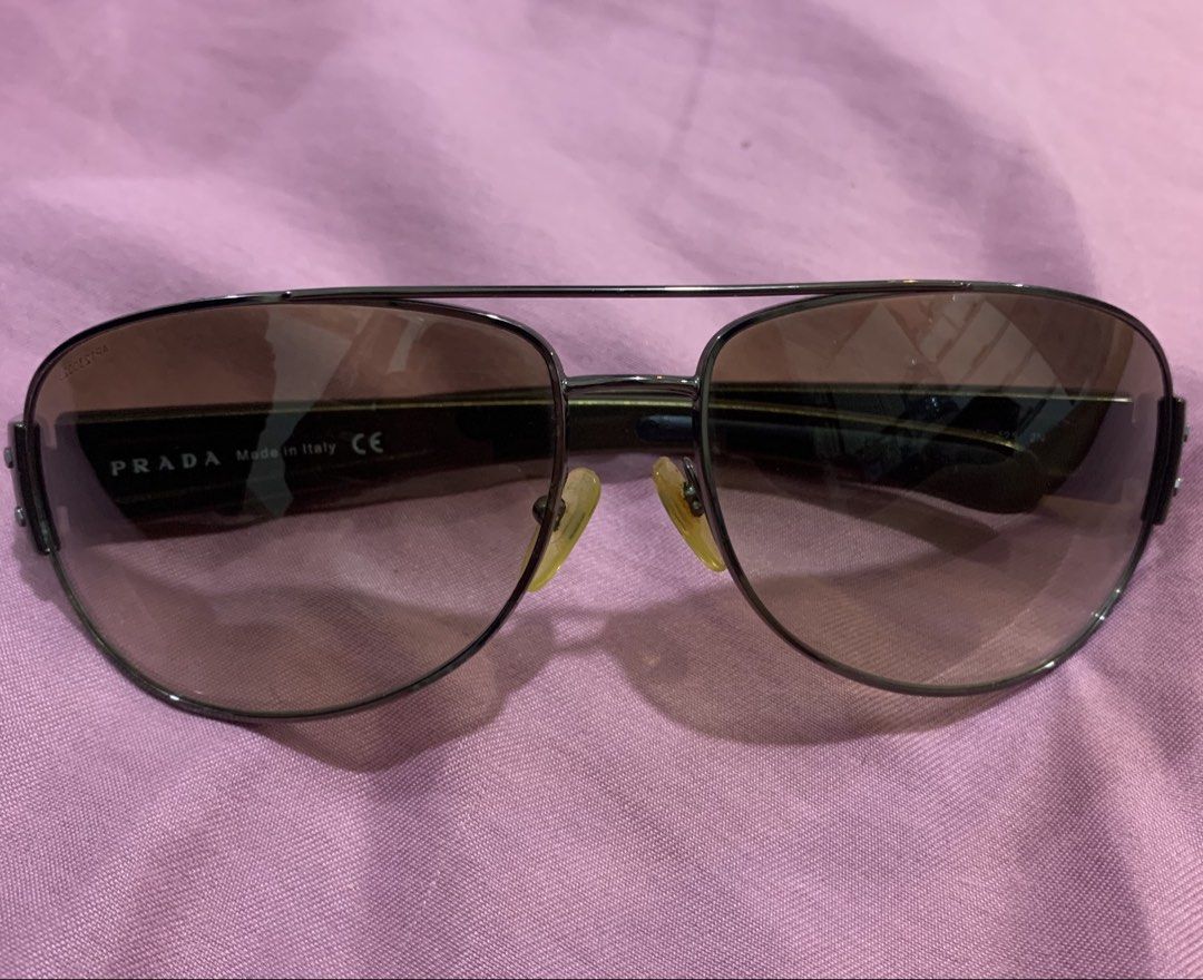 Prada Sunglasses 65-15 (Category: Sunglasses & Eyewear) located in Cabiao. Submitted by imeon13 (Listing ID 1466765405, Image 1). Description: No gas2x lenses like new Coded lense.