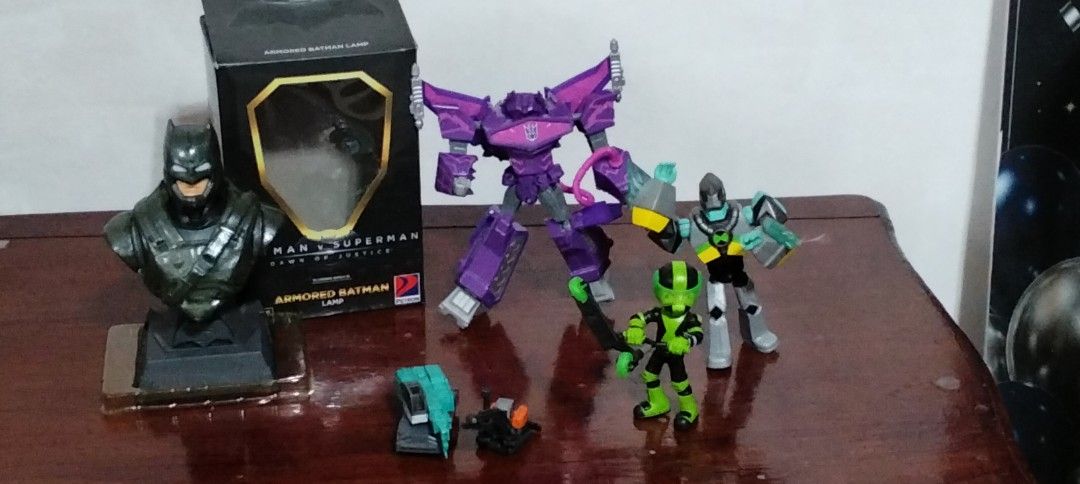 Pre-loved toys (Category: Action & Battle Toys) located in Paranaque City. Submitted by happyfinds2 (Listing ID 1466572939, Image 1). Description: - Bundle set of assorted action figures and toys, including - batman with original box - Purple Transformers - Shockwave - Ben 10 -two mini construction vehicles - Great for collectors or kids - Selling as a set to clear shelf space.