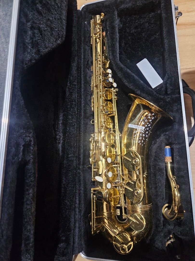Premiere Tenor Saxophone with Hard Case (Category: Musical Instruments) located in Naga. Submitted by pacific_brent (Listing ID 1466640789, Image 1). Description: tenor saxophone Beautifully engraved bell area with decorative patterns and custom lettering stickers for students and intermediate players low G growling, might need repadding .