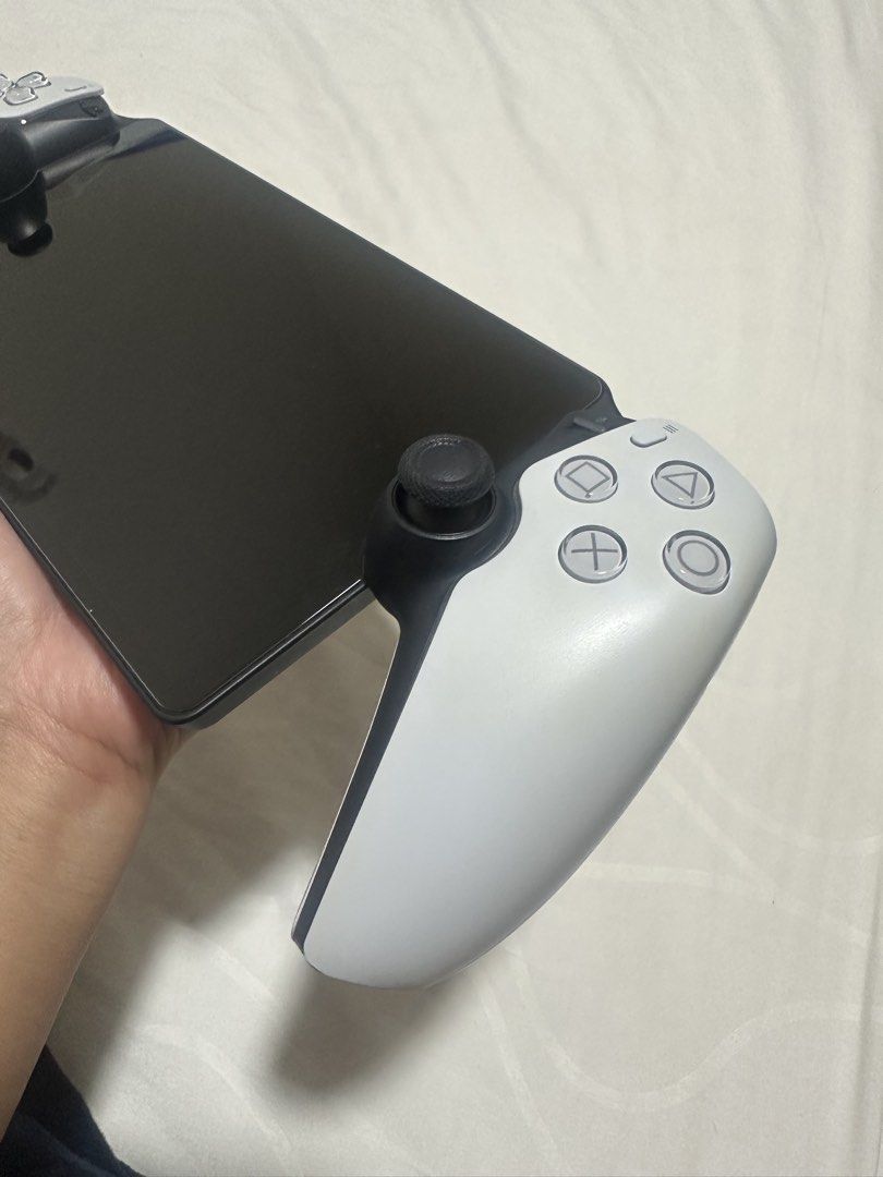 PS Portal (Category: PlayStation) located in Bacoor. Submitted by miles_00 (Listing ID 1464683954, Image 2). Description: - Bought Jan. 2025 (1st owner, with receipt as proof) - Practically new, bilang lang sa kamay kung ilang beses nagamit - With box, screen protector and charging cable - with slight discoloration on the handles (see photos) - RFS: No time to use between parent duties and playing Switch 2 - Meetups: Robinsons Manila (Mon-Thur. o