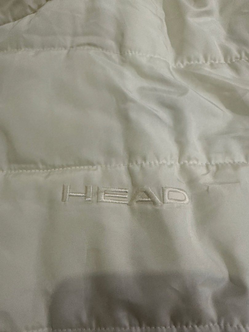 Puffer Hoodie By Head (Category: Coats, Jackets and Outerwear) located in Tagaytay City. Submitted by prelovedbytmj (Listing ID 1466615617, Image 3). Description: Puffer Hoodie Jacket by Head. Color Beige. Size Large. Can wear small to large for women. In good condition. Mura na po to.