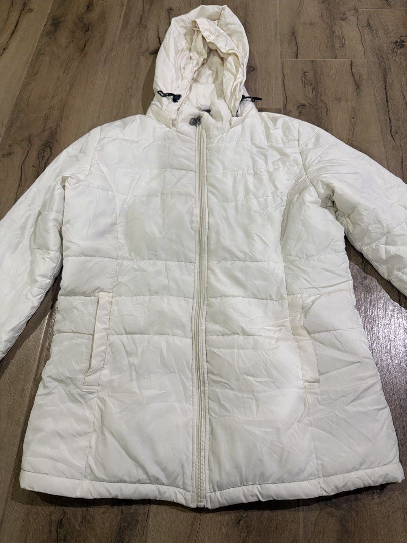Puffer Hoodie By Head (Category: Coats, Jackets and Outerwear) located in Tagaytay City. Submitted by prelovedbytmj (Listing ID 1466615617, Image 1). Description: Puffer Hoodie Jacket by Head. Color Beige. Size Large. Can wear small to large for women. In good condition. Mura na po to.
