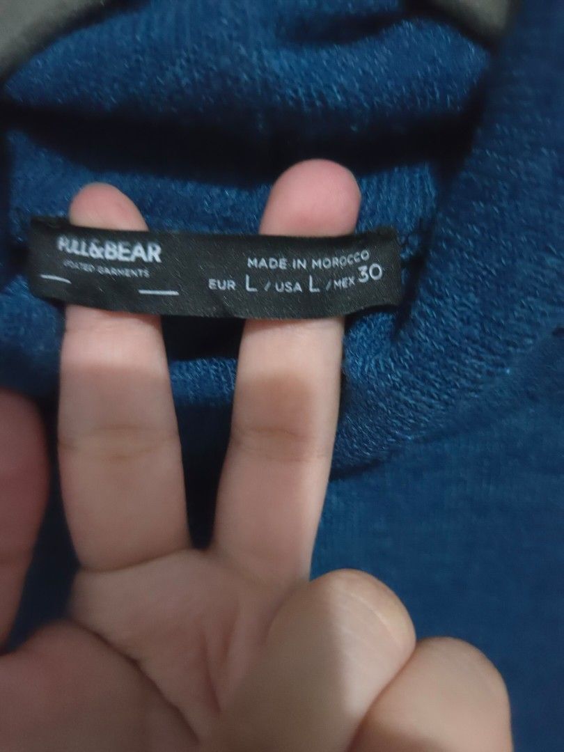 Pull&Bear Blue Turtleneck Long Sleeve Sweater (Category: Longsleeves) located in Quezon City. Submitted by sashasarisarishoppe (Listing ID 1466675853, Image 3). Description: - Brand: Pull&Bear - Size: L - Color: Solid Blue - Material: Soft textured knit - Features: Long sleeves, turtleneck - Condition: Worn a few times, great shape - Style: Easy to match with jeans or skirts for cooler weather.
