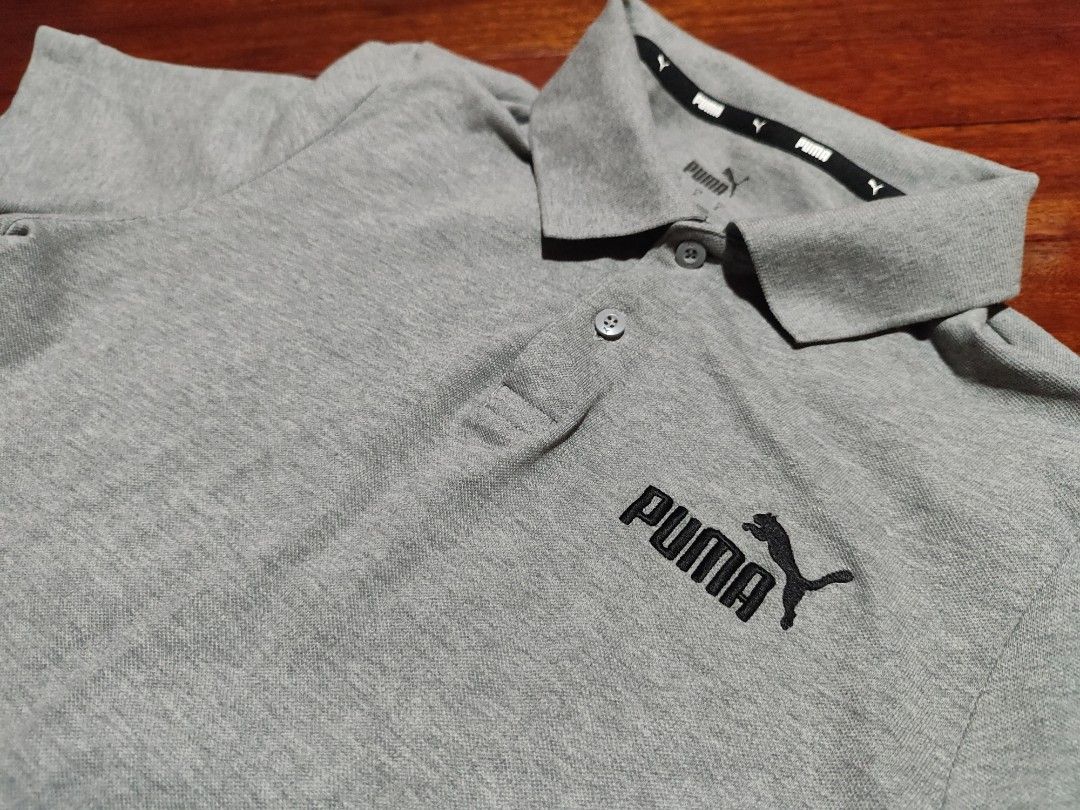 PUMA (Category: Tshirts & Polo Shirts ) located in Manila. Submitted by sepjidawn (Listing ID 1466612414, Image 3). Description: PUMA condition; 9,8/10 size; small color; gray ⏹️PRICE; 199 🟡original pum@ yan with extra button sa loob yan and embroidered pum@ logo 🟡comfy tela pde din sa medium frame pero fit style na sya 🟡use once only 🟡goods pang gala pamorma 🟡color may be varie due lightning 🟡UGALIIN BASAHIN ANG BUONG DETAILS WAG MASYADO E
