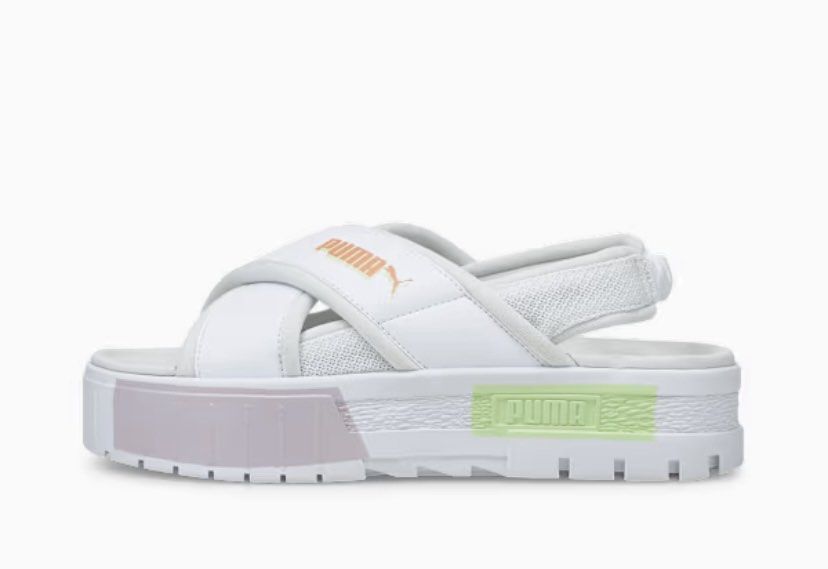 Puma Mayandal White Cross Strap Platform Sandals (Category: Flats & Sandals) located in Baguio. Submitted by workwear2600 (Listing ID 1466591407, Image 1). Description: - Brand: Puma - Style: Platform sandals with chunky crossover straps - Colorway: White with bright orange and yellow side branding - Details: Pastel pink and green block midsole, adjustable heel strap - Comfort: Super comfy cushioned sole and wearable platform height - Versatility