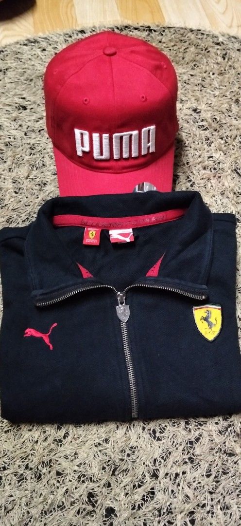 Puma Scuderia Ferrari Zip Jacket and Red Cap Bundle (Category: Coats, Jackets and Outerwear) located in Paranaque City. Submitted by michael-08 (Listing ID 1466756072, Image 1). Description: - Authentic Puma Scuderia Ferrari matching set - Black full-zip track jacket, Size Large, with official product tag, shield badge, and red detailing - Matching red Puma cap with bold white branding and curved brim - Meet-ups possible or shipping via J&T/Flash