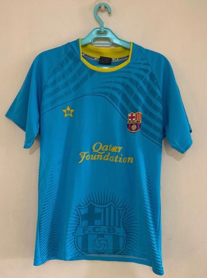 Qatar Football Jersey (Category: Tshirts & Polo Shirts ) located in Valenzuela. Submitted by clickandshoppreloved (Listing ID 1466619717, Image 1). Description: Qatar Football Jersey Onhand Medium Ontag, (23L x 16W) Color : Blue (Excellent Condition, Good As New).