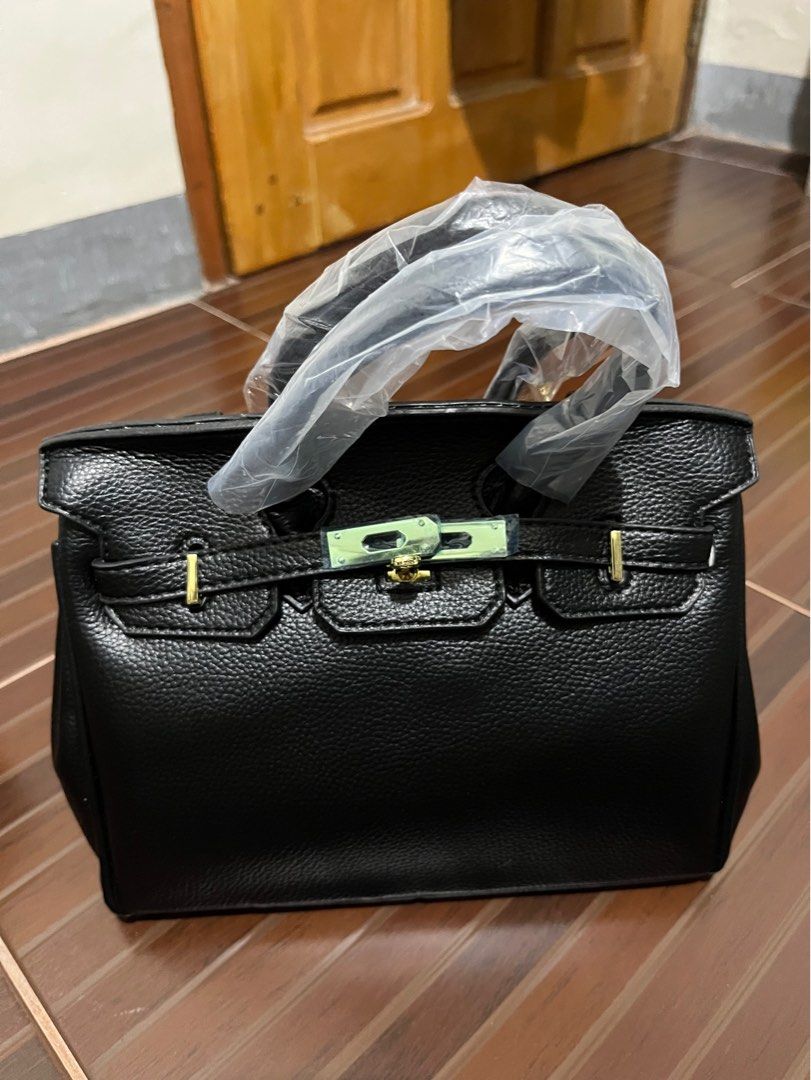 Quality Black Leather Bag (Category: Tote Bags) located in Cabanatuan. Submitted by bwsventures (Listing ID 1466575678, Image 1). Description: Black leather bag 25cm Quality item Brand new Shipping fee to be paid by buyer. Free shipping if you buy 2 or more items from me. .