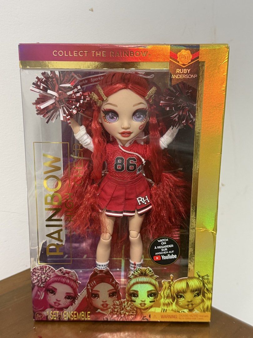 Rainbow High Cheer Ruby Anderson Fashion Doll - (Category: Kids Toys) located in Manila. Submitted by prelovedbyramiah (Listing ID 1466696270, Image 1). Description: Red Cheerleader Outfit with Pom Poms and Accessories.
