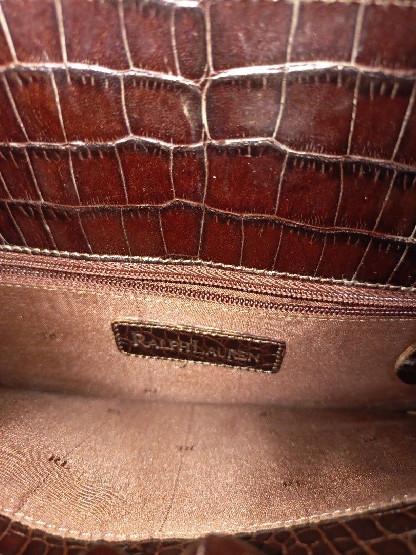 Ralph Lauren Brown Satchel Bag (Category: Tote Bags) located in Bacoor. Submitted by imshining_23 (Listing ID 1466640419, Image 3). Description: Ralph Lauren Brown Satchel Purse Previously Loved in good condition - Two Inner Zipper Pockets - Strap Drop Adjustable - Genuine Leather.