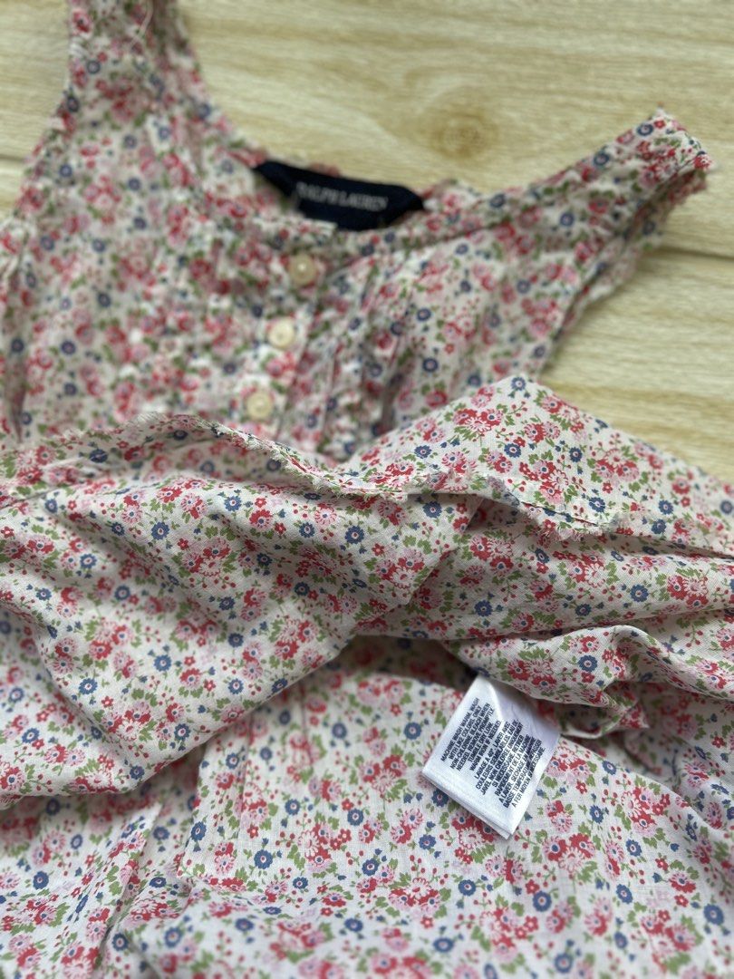 Ralph Lauren lightweight top (Category: Babies & Kids Fashion) located in Cebu City. Submitted by yjainani (Listing ID 1466580314, Image 3). Description: featuring a pink and multicolor ditsy floral print with pintucks, front buttons, and a ruffled hem.