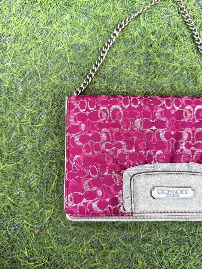 RARE Coach Raspberry Lurex Clutch Bag (Category: Clutches) located in Quezon City. Submitted by p0tatooooooo (Listing ID 1466583392, Image 2). Description: Elevate your evening look with this vintage Coach Lurex clutch bag, featuring a striking hot pink/magenta signature Coach pattern with shimmering metallic Lurex detailing. Perfect for parties, weddings, dinners, and special occasions 🪩 - Detachable chain strap .