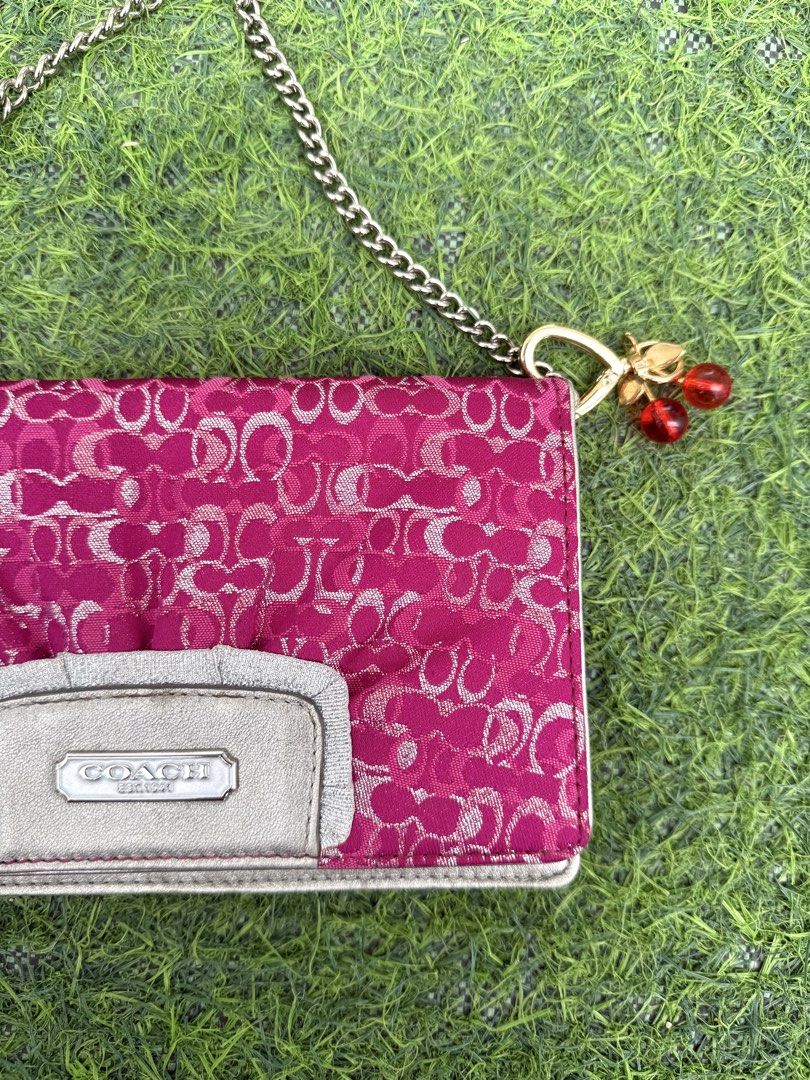 RARE Coach Raspberry Lurex Clutch Bag (Category: Clutches) located in Quezon City. Submitted by p0tatooooooo (Listing ID 1466583392, Image 3). Description: Elevate your evening look with this vintage Coach Lurex clutch bag, featuring a striking hot pink/magenta signature Coach pattern with shimmering metallic Lurex detailing. Perfect for parties, weddings, dinners, and special occasions 🪩 - Detachable chain strap .