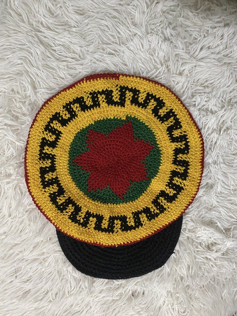 Rasta Crochet Visor Hat Jamaica Colors (Category: Caps & Hats) located in Dapitan. Submitted by jadecagatan_4255a7 (Listing ID 1466715923, Image 1). Description: - Handmade crochet visor hat - Vibrant red, yellow, green, and black colorway with a center star design - Slouchy beanie style body - Solid black stiff brim with a stylish yellow trim accent - Perfect for casual wear, festivals, and outdoor events - Comes from a smoke-free home.