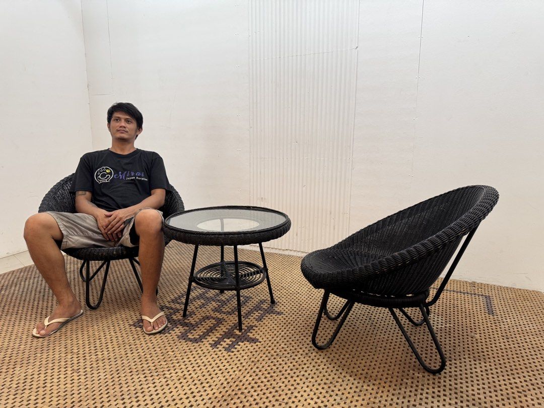Rattan Lounge Set (Category: Tables & Sets) located in Quezon City. Submitted by matetdevis13 (Listing ID 1466727626, Image 3). Description: Black Wicker/Rattan Lounge Chair Set with Glass-Top Table Price: 10,500 Table: 24 x 19 Chair: L30 x W27 x H27/13 In good condition Code JMD52-M455.