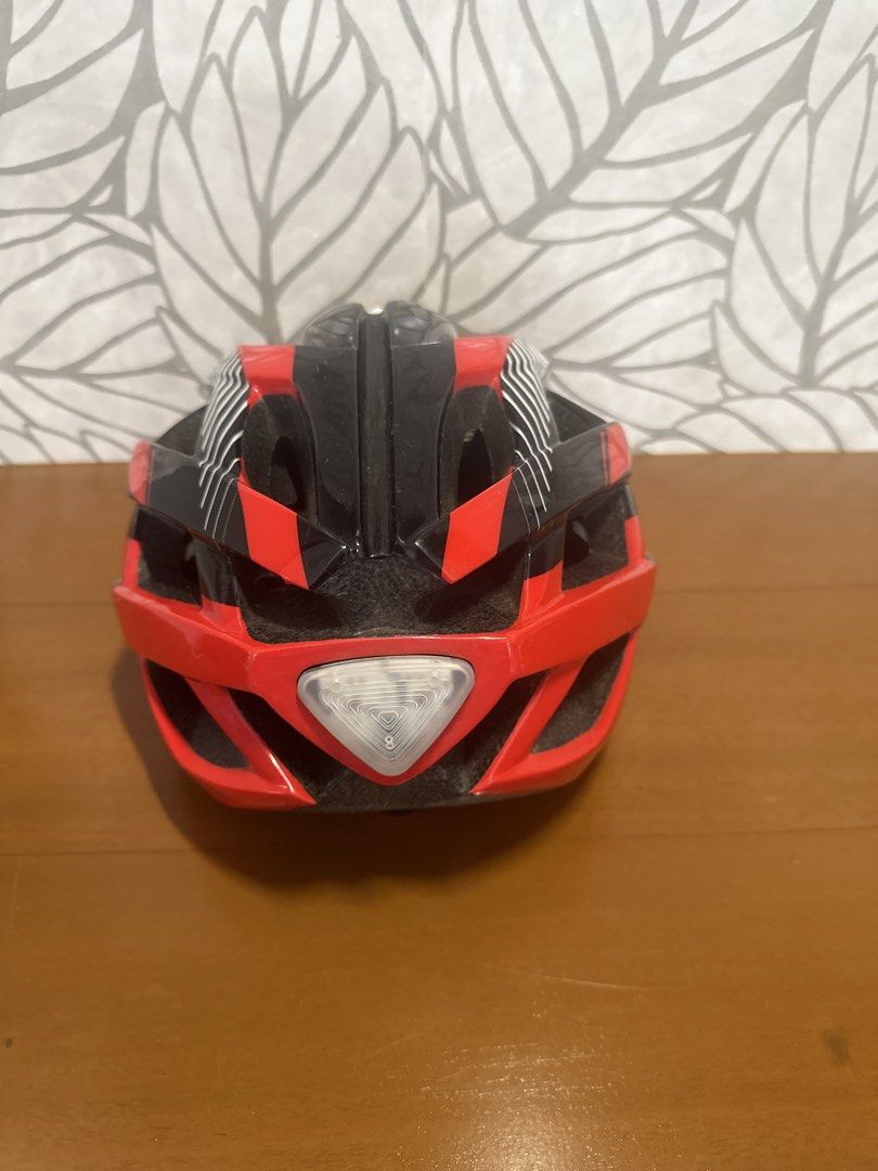 Red Black and White Cycling Helmet (Category: Bicycles) located in Makati City. Submitted by twodoxies (Listing ID 1466609449, Image 3). Description: - Color: Red, black, and white - Adjustable straps with quick-release buckle - Comfortable padded interior with mesh netting for airflow - Lightweight shell with multiple ventilation ports Location: Makati / Las Pinas.