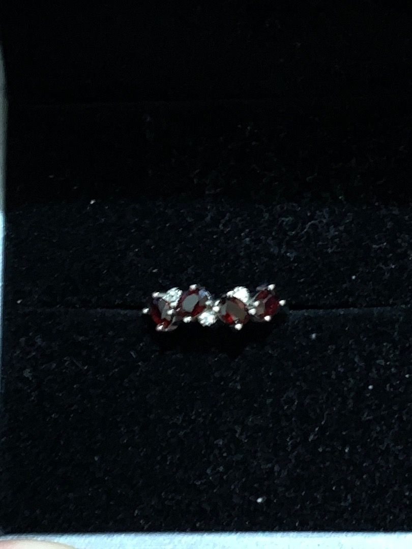 Red Garnet gemstone s925 ring with certificate (Category: Rings) located in Quezon City. Submitted by itscxyy (Listing ID 1466764585, Image 1). Description: - Material: Genuine natural garnet and S925 - Design: adjustable and stunning deep red garnet oval-cut stones - Authenticity: Clearly stamped metal hallmark on the inner band - Inclusions: Comes with an official authentication certificate card featuring a QR code and inspection seal - Conditi
