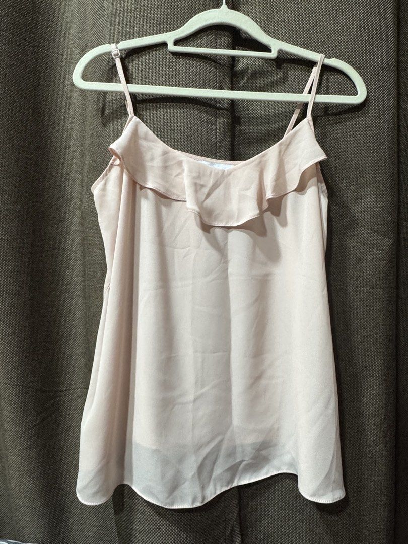 Red Herring Pink Ruffle Cami Top Size 10 (Category: Sleeveless) located in Guiguinto. Submitted by thehiddenwardrobe (Listing ID 1466616257, Image 1). Description: - Brand: Red Herring - Style: Cami top with layered ruffle neckline - Color: Soft pink - Size: UK 10 / US 6 (Tag attached) - Details: Adjustable spaghetti straps, lightweight fabric, relaxed fit - Condition: Great, clean, and ready to wear.