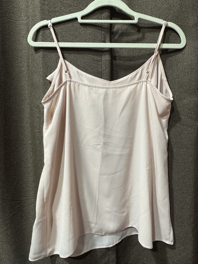 Red Herring Pink Ruffle Cami Top Size 10 (Category: Sleeveless) located in Guiguinto. Submitted by thehiddenwardrobe (Listing ID 1466616257, Image 2). Description: - Brand: Red Herring - Style: Cami top with layered ruffle neckline - Color: Soft pink - Size: UK 10 / US 6 (Tag attached) - Details: Adjustable spaghetti straps, lightweight fabric, relaxed fit - Condition: Great, clean, and ready to wear.