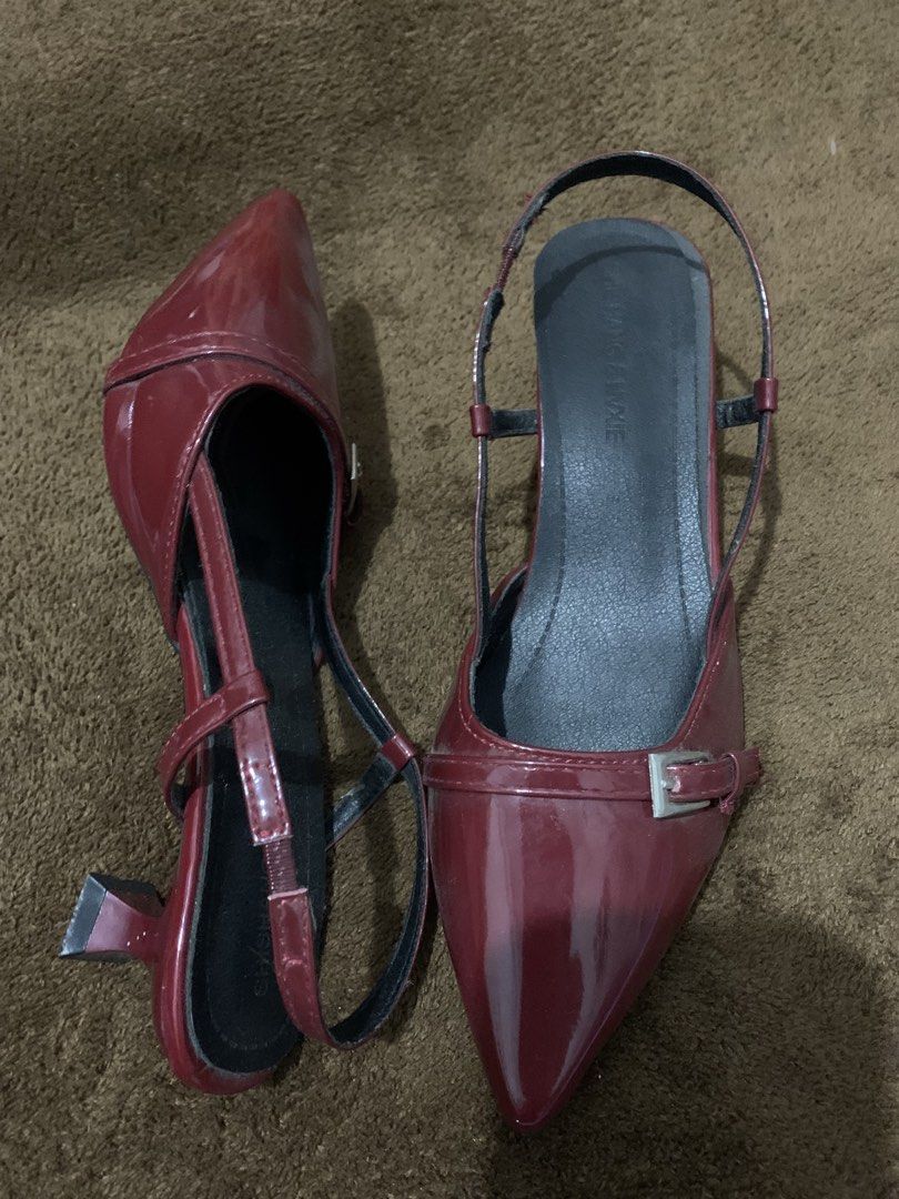 Red Patent Leather Slingback Kitten Heels (Category: Heels) located in Daraga. Submitted by shevvv28 (Listing ID 1466694661, Image 3). Description: (ONCE USED: Pinag xmas party lang year 2025 and di na nasuot) - Style: Burgundy slingback heels with pointed toes and low sculpted heels - Finish: Shiny patent leather-look with front strap buckle detail - Comfort: Walkable low heel height, cushioned black insoles, and secure back strap - Versatility: