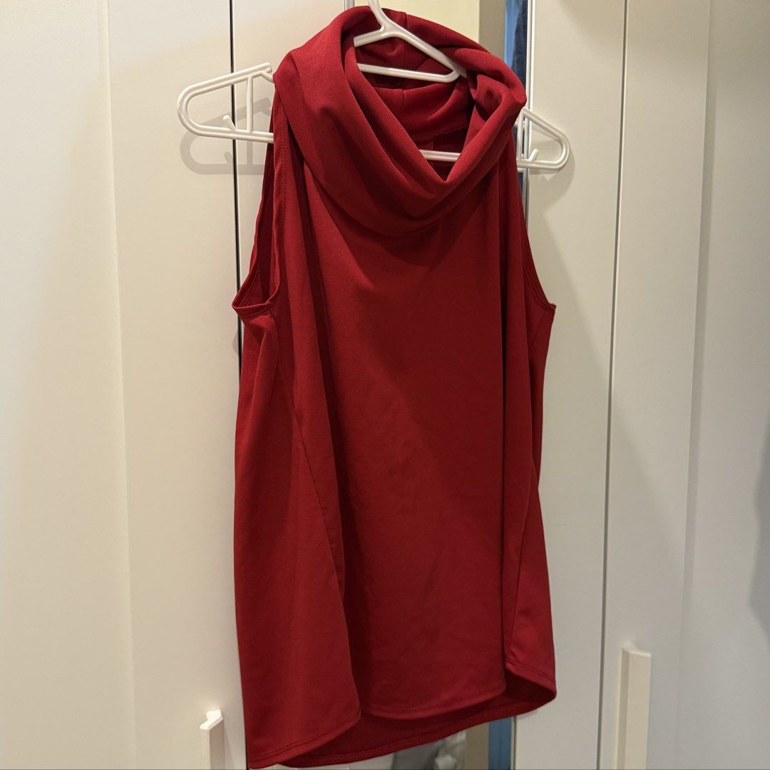 Red Sleeveless Cowl Neck Top (Category: Sleeveless) located in Marikina City. Submitted by lovegoeson (Listing ID 1466684751, Image 2). Description: - Color: Rich red - Style: Sleeveless with a flattering cowl neck - Details: Upper back pleats for added style - Fit: Relaxed through the body - Fabric: Smooth, stretchy, and soft - Versatility: Easy to pair with jeans or skirts for casual days.