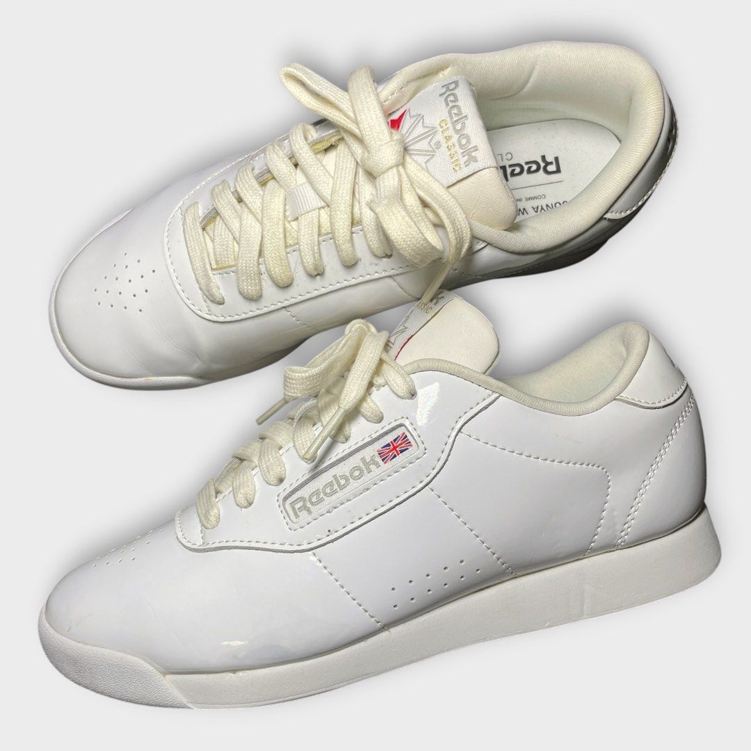 Reebok x Junya Watanabe - Patent Leather Trainers (Category: Sneakers) located in Los Banos. Submitted by declutterking (Listing ID 1466664918, Image 1). Description: Size 7 (24 cm) • round-toes • lace-up closure • blueish stains and leather peels • pair only Excellent condition Authentic.