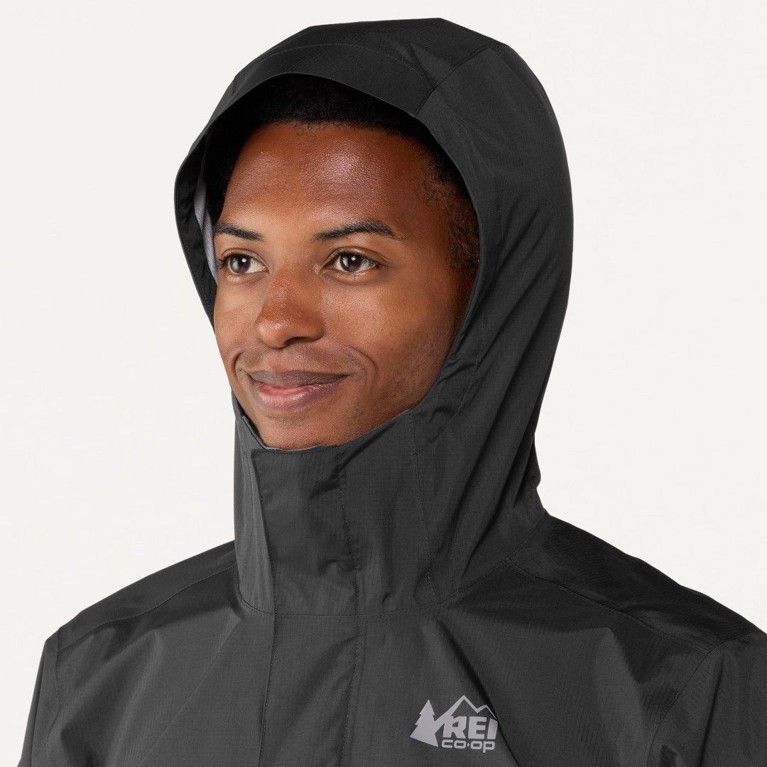 REI Co-op Peak 2.5L Rain Jacket Black (Category: Coats, Jackets and Outerwear) located in Davao. Submitted by vernoneighty4 (Listing ID 1466714895, Image 1). Description: - Brand: REI Co-op - Color: Black small W19.5 L25.5 - Technology: Peak 2.5L waterproof tech - Features: Attached hood with drawcords, button snap at bottom hem - Packable: Packs neatly into its own included grey storage pouch with zip closure - Ideal for: Outdoor trails and ever