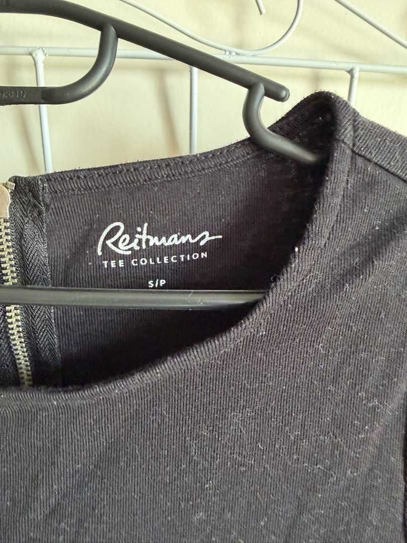Reitmans Tee Collection Black Long Sleeve Top (Category: Longsleeves) located in Quezon City. Submitted by bubspreloved (Listing ID 1466700383, Image 2). Description: - Brand: Reitmans Tee Collection - Size: S/P - Color: Black - Material: Ribbed knit (stretchy and comfortable) - Details: Scoop neckline with back zipper - Style: Versatile basic everyday piece, easy to match with jeans or skirts.