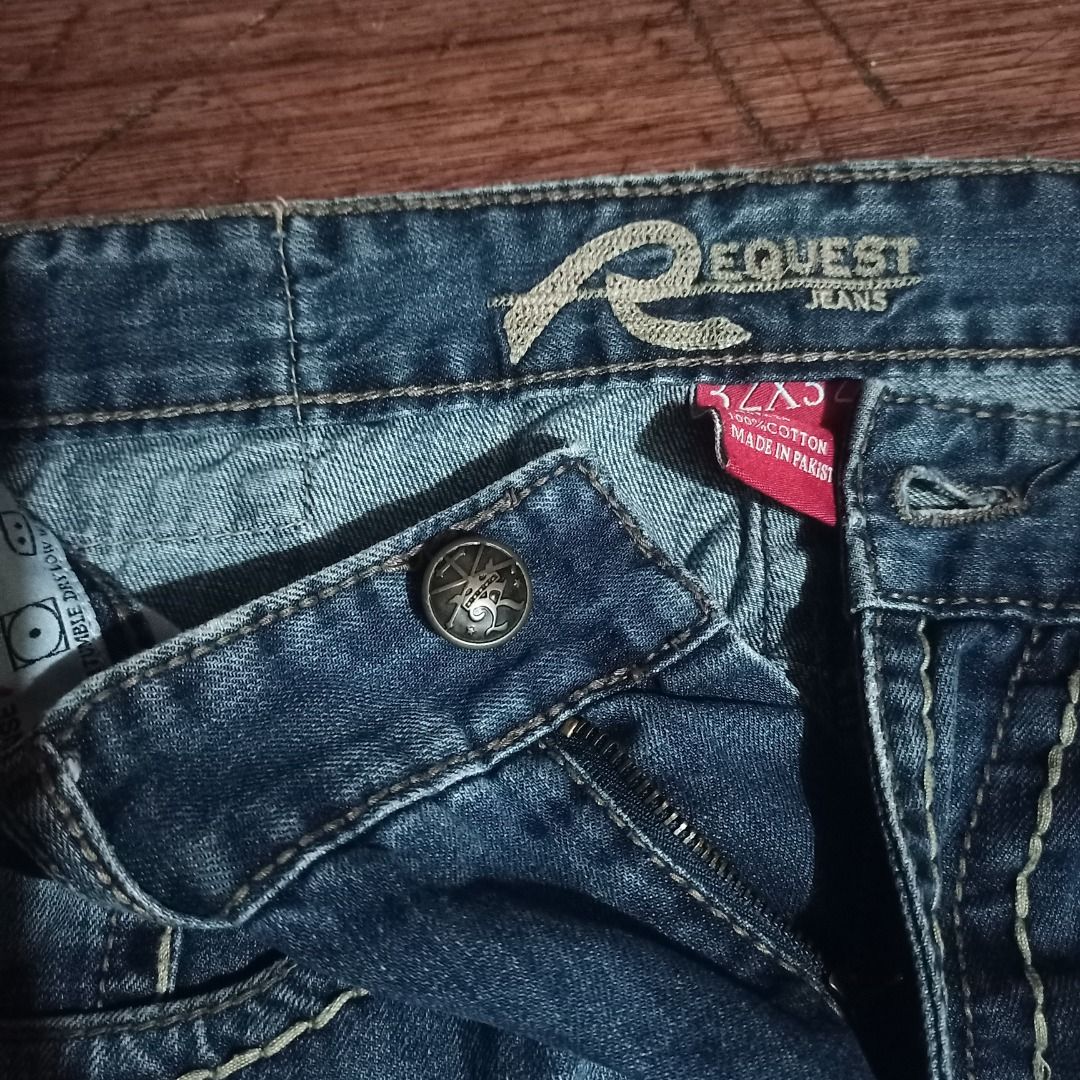 Request Jeans Denim Pants Size 32x32 Y2K Flap Pockets (Category: Jeans) located in Cavite. Submitted by kurtgg.what (Listing ID 1466689447, Image 3). Description: Great condition, zipper working. Courier: J&T / Lalamove - Size: 32x32 (tag inside waistband) - Color/Wash: Dark wash blue with slight whiskering on thighs - Fit: Straight leg - Details: Heavy contrast stitching throughout - Closure: Metal button fly - Pockets: Flap back pockets with bu