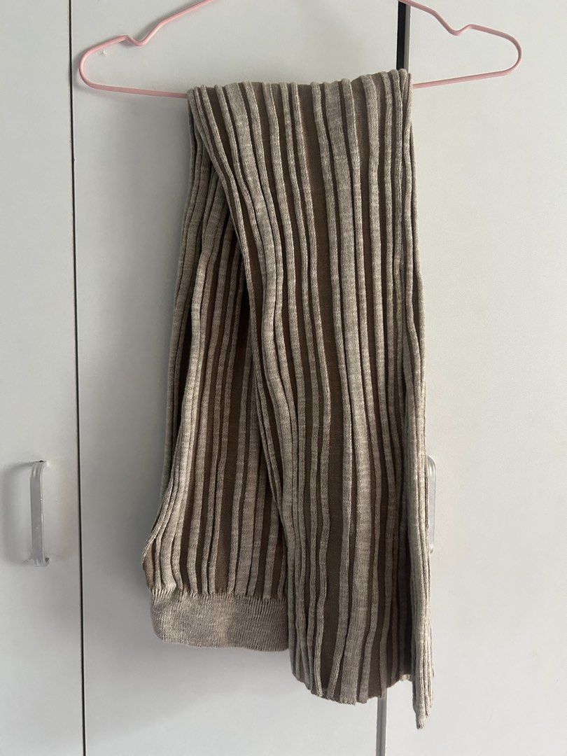 Ribbed knit flare pants beige brown (Category: Other Bottoms) located in Quezon City. Submitted by emayeah (Listing ID 1466575760, Image 1). Description: - Color/Pattern: Beige and brown stripes - Material: Super stretchy, lightweight ribbed knit - Fit: High waist with a comfy elastic waistband - Style: Flared legs at the bottom - Versatility: Great for lounging at home or styling with oversized tees and sweaters Never been used.