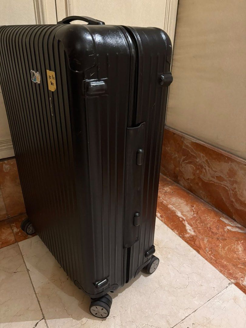 Rimowa salsa - Large (Category: Luxury Bags & Wallets) located in San Juan City. Submitted by teas_atbp (Listing ID 1466656480, Image 3). Description: Rimowa Salsa Large – Black Selling my Rimowa Salsa Large in classic black * Condition: 8/10 – very good overall condition * No major damage * Wheels, exterior, and structure are in very good condition * Minor issues: Small stain on one of the interior straps; One interior strap is missing (please s