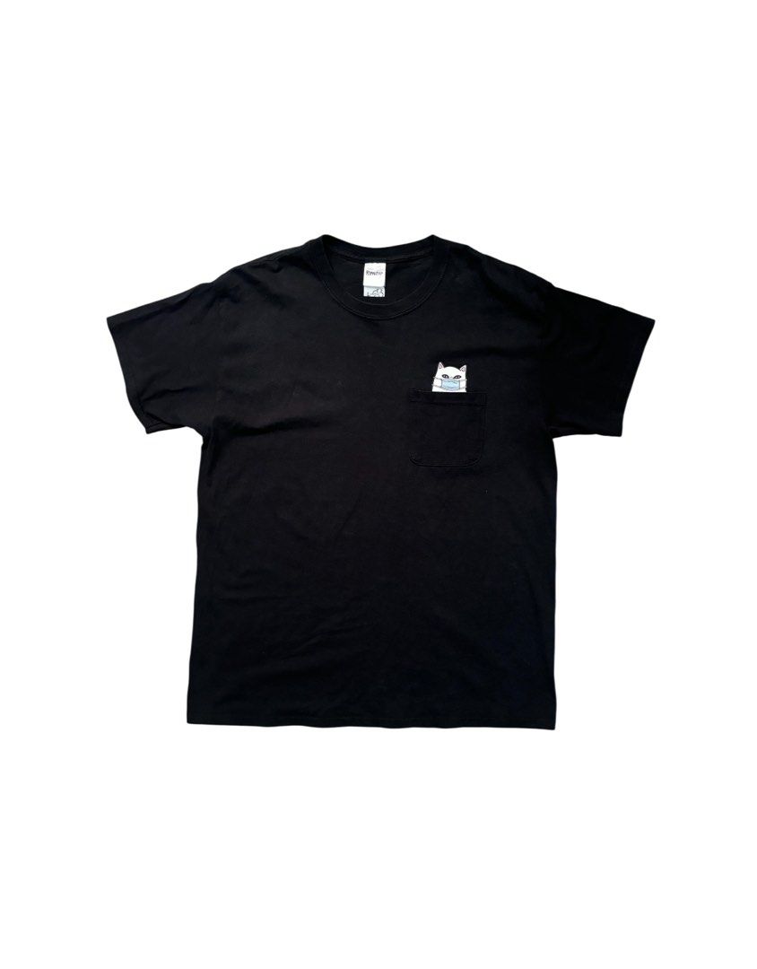 RIPNDIP Lord Nermal Pocket Tee Black Size L (Category: Tshirts & Polo Shirts ) located in Taguig. Submitted by j.gloria (Listing ID 1466702682, Image 1). Description: - Brand: RIPNDIP - Color: Black - Size: Large - Design: Lord Nermal peeking out of chest pocket with blue face mask and middle finger - Condition: Clean fabric, excellent streetwear staple - Styling: Easy to pair with jeans or cargo pants.