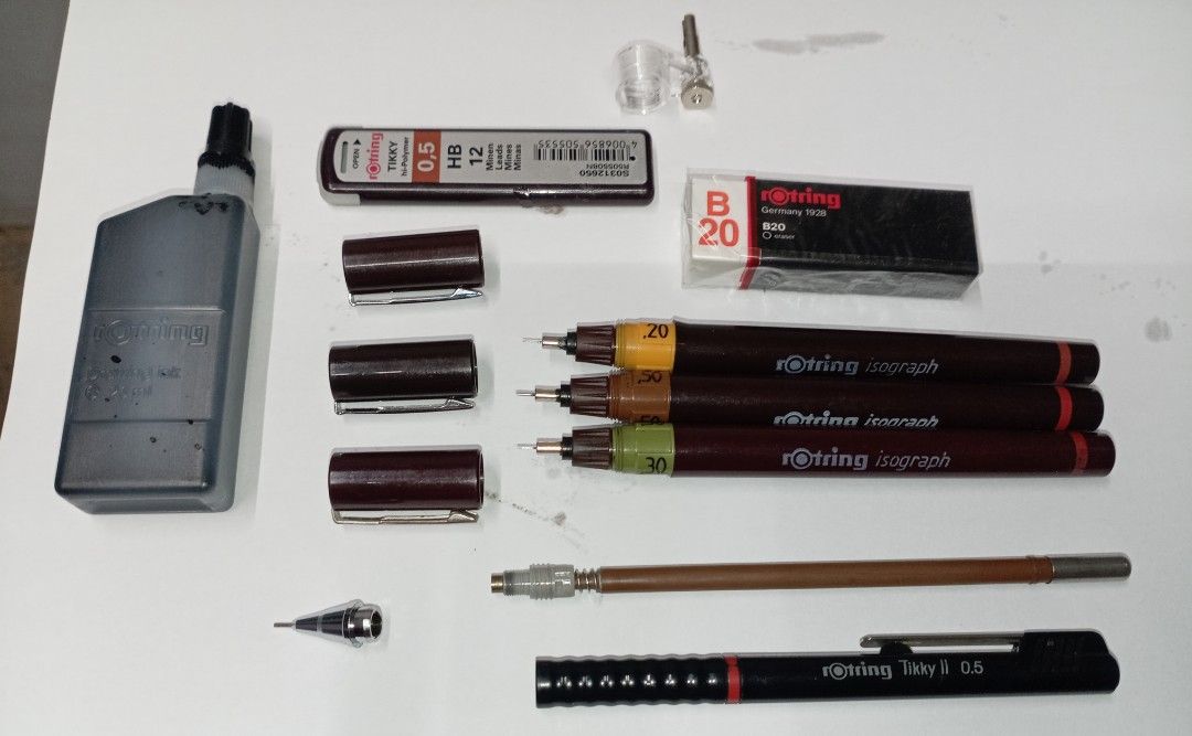 Rotring College Set Germany 1928 Technical Pen Set (Category: Stationery & School Supplies) located in Manila. Submitted by joelssalum87443 (Listing ID 1466692760, Image 2). Description: - Complete Rotring college drawing set in original maroon hardcase box - 3 Isograph technical pens: 0.20, 0.30, and 0.50 line widths - Rotring Tikky II 0.5mm mechanical pencil with replacement leads - Includes drawing ink bottle, B20 eraser, and compass attachmen