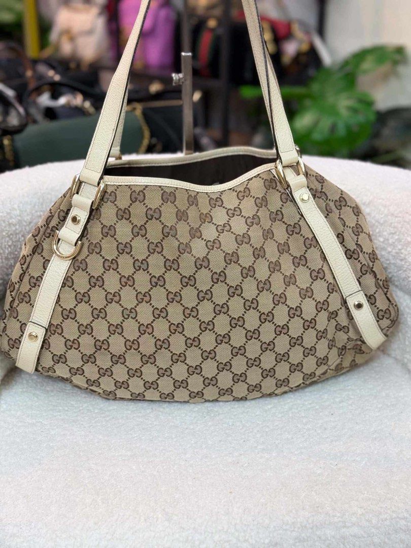 RUSH! Gucci GG Canvas Medium Abbey Shoulder Bag (Category: Luxury Bags & Wallets) located in Quezon City. Submitted by garietomcloset (Listing ID 1466673062, Image 1). Description: Pre loved bag. Minimal signs of usage Last price indicated. Inclusions: provided dust bag and COA Location: Quezon City RUSH!.