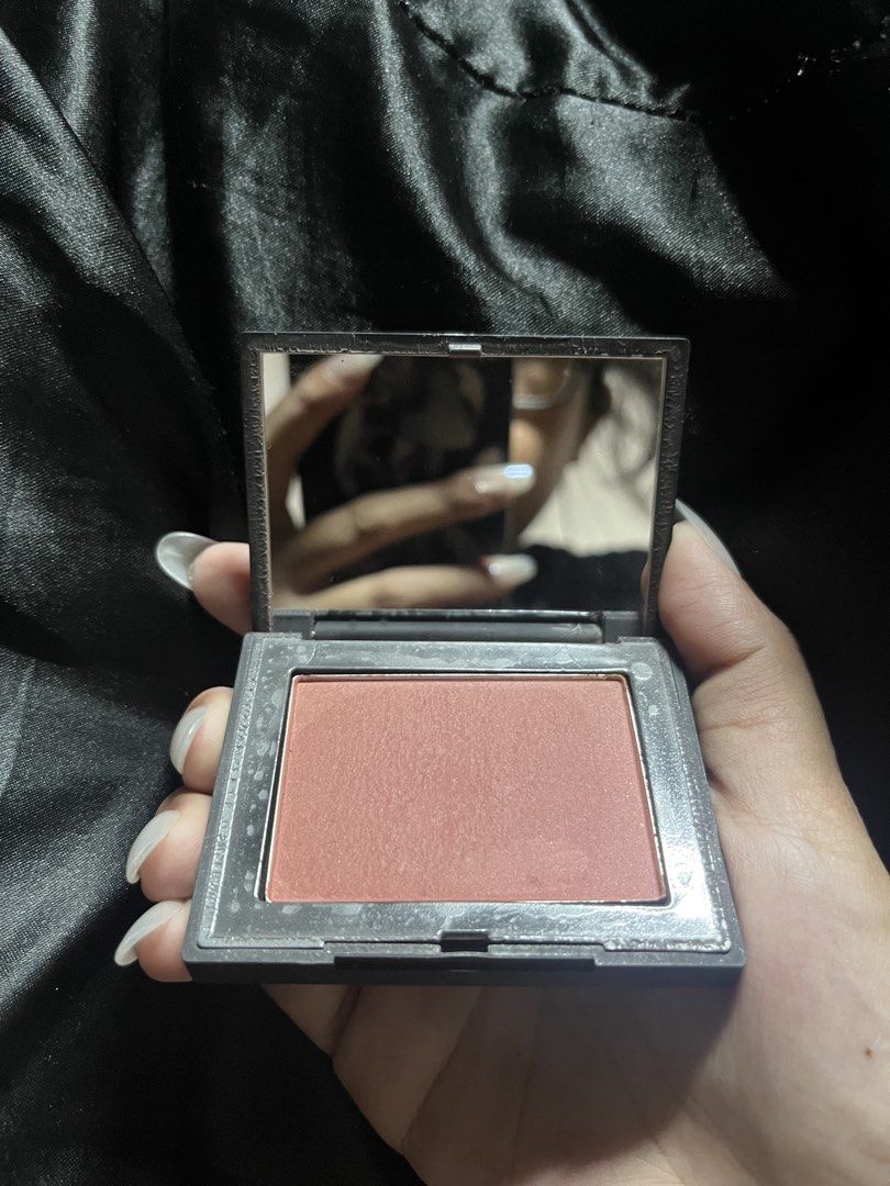 [RUSH] NARS Powder Blush in Infatuated (Category: Makeup) located in Manila. Submitted by newaccountdotcom (Listing ID 1466678125, Image 2). Description: NARS Powder Blush - product only - no box, no receipt - exterior shows standard rubberized NARS wear and peeling, but interior mirror and blush itself are fully functional - 98% left - bought around feb. 2025 in store - RFS: decluttering; barely used / didnt like how it looked on my cheeks - mee